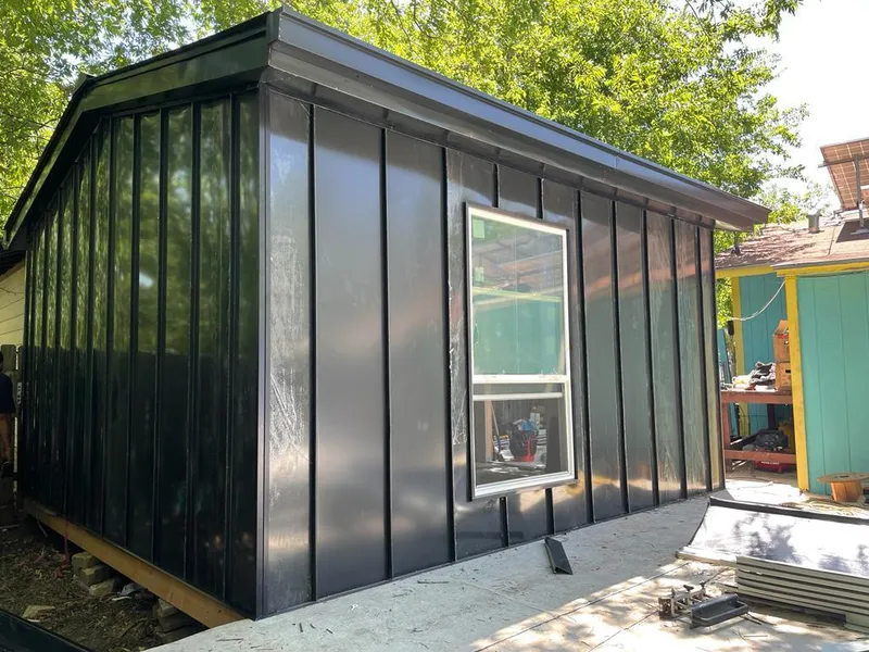 Black standing seam metal wall panels for Metal Roof Installation in Olean