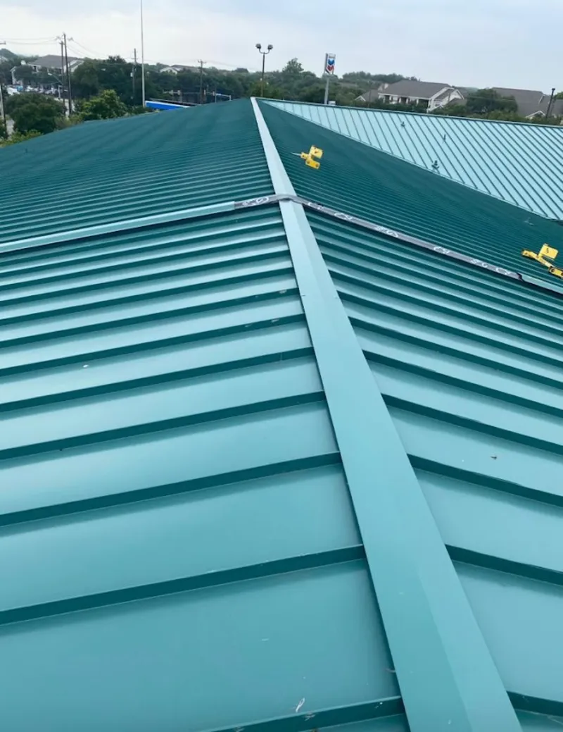 Green commercial metal roof ridge and valley for Metal Roof Repair in Olean