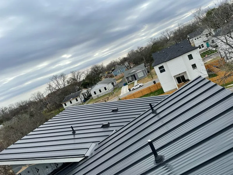 Standing seam metal roof panels with vents for Skylight Repair in Olean